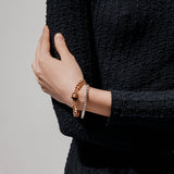 Two-piece layered bracelet stack featuring a gold chunky chain bracelet and a silver diamond-accented tennis bracelet. ||| GOLD