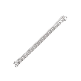 Close-up of The Bubble Curb Chain Bracelet Stack, a silver layered bracelet set featuring a chunky curb chain and a tennis bracelet with round-cut stones. ||| SILVER
