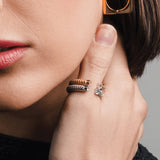 Gold and silver **Square Mix Hoops Earrings** paired with two stacked mixed metal rings and a crystal-accented ring. ||| GOLD