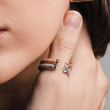 Gold and silver **Square Mix Hoops Earrings** paired with three stacked rings in mixed metal tones. ||| SILVER