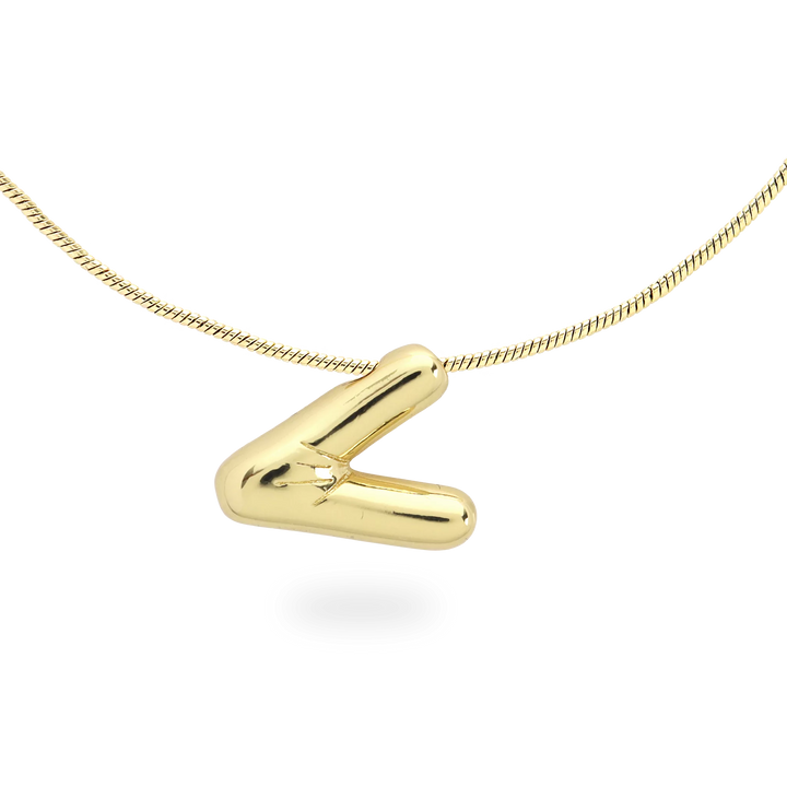 The BALLOON LETTER NECKLACE, a delicate gold necklace featuring a playful, balloon-shaped letter "V" pendant.||| V/GOLD