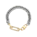The Ischia Bracelet, a bold two-tone bracelet featuring a thick silver chain and a gold crystal-encrusted paperclip link accent. This stylish piece combines silver and gold elements, perfect for adding a touch of modern elegance and contrast to any look. ||| SILVER
