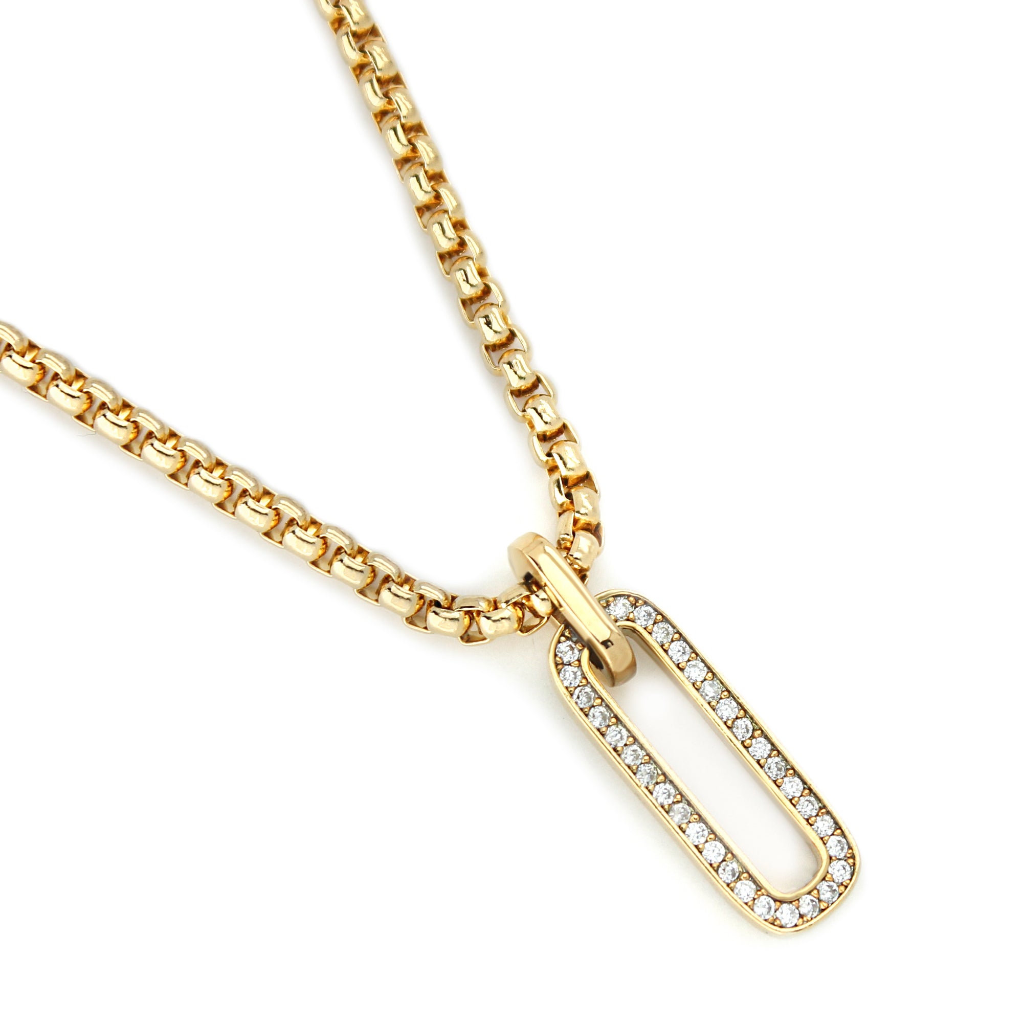 Oval shaped 18k gold plated and cubic zirconia charm and the gold chain of the Procida Necklace.