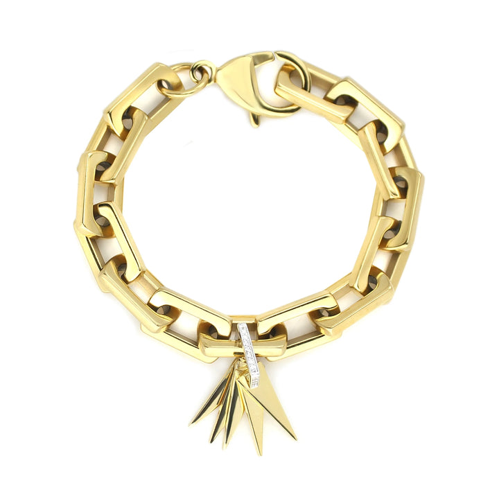 The Light Bracelet which is a bold, single-piece bracelet features chunky, geometric gold links adorned with a cluster of pointed charms and a crystal-studded bar detail, creating a statement accessory perfect for elevating any outfit.