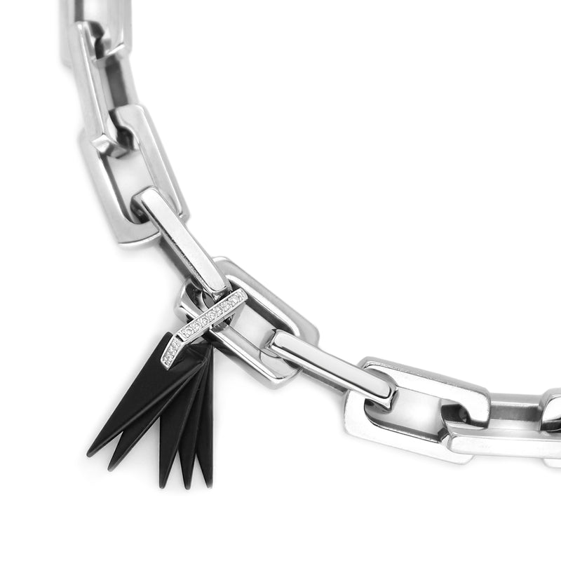 Light Bracelet Silver which is 8 inches in length, Stainless steel link chain with Black Triangle charms & Zirconia.