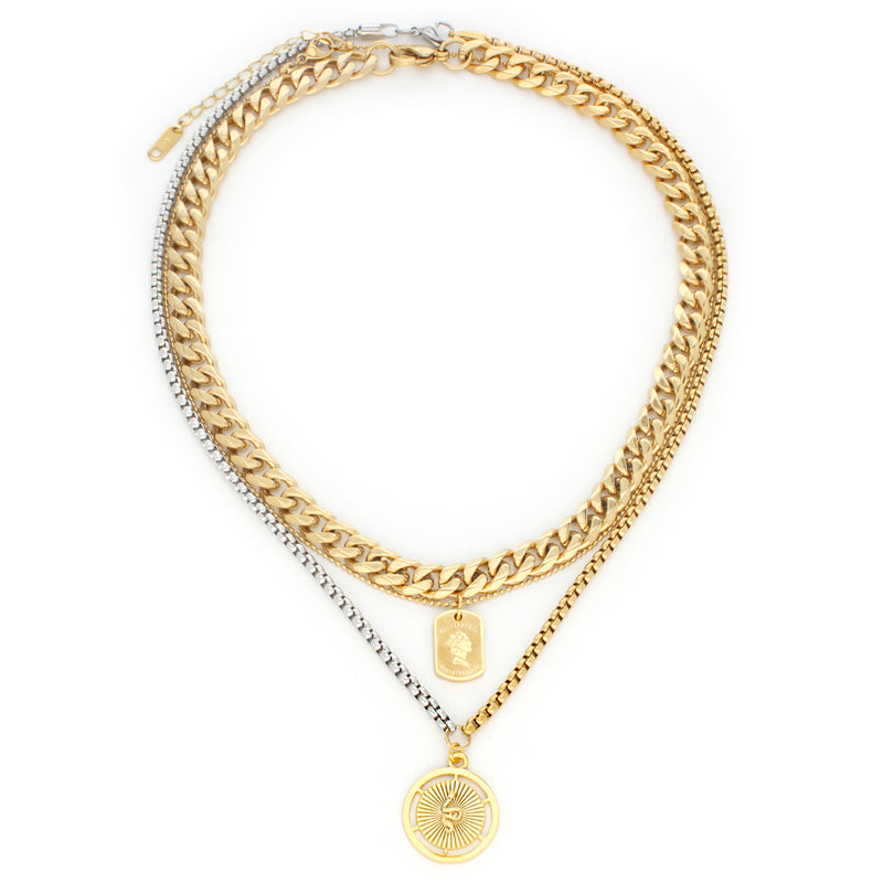 3 Chains Layered Set THE COIN & THE SNAKE which includes a gold plated chain, thin gold chain with coin square pendant, and longer half gold half silver necklace with a circle pendant that has a snake details on it.