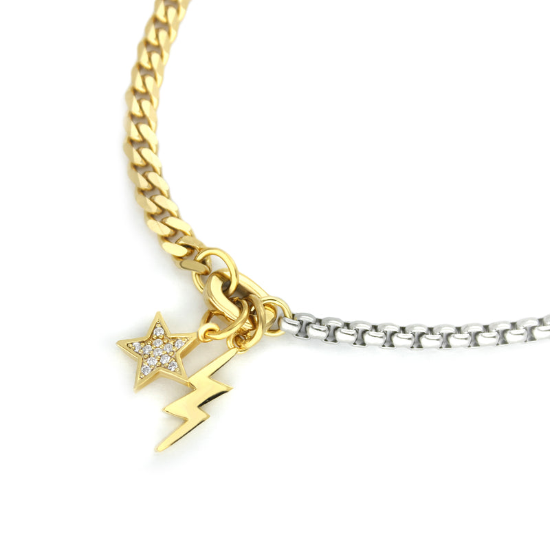 Half stainless steel chain and half stainless steel 18k gold plated chain with an 18k gold plated zirconia star pendant, and gold plated lightning pendant of the Shakerato Blended bracelet.