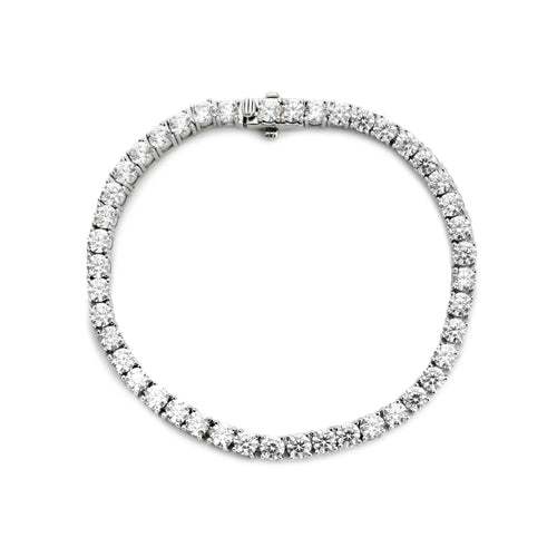 The Luxury Tennis Bracelet, a silver bracelet featuring a continuous line of sparkling diamond-like stones.