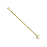 The Marocchino Blended Bracelet, which is a charming gold bracelet, features a classic chain design adorned with three delicate charms: a sparkling cubic zirconia, a star with crystal accents, and a pointed arrow charm. This single-piece bracelet combines elegance and playful detail, perfect for adding a unique touch to any wrist stack or as a standalone accessory.






