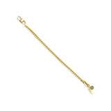 The ORZO BLENDED BRACELET, which is a single gold bracelet with a curb chain design, features playful charms, including a green gem-encrusted circle and a sleek lightning bolt. This bold and versatile accessory adds a pop of color and character, perfect for stacking or wearing alone for a statement look.