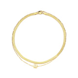 The You & The Snake, a two-piece gold necklace set featuring a snake chain and a delicate chain with a cubic zirconia charm.
