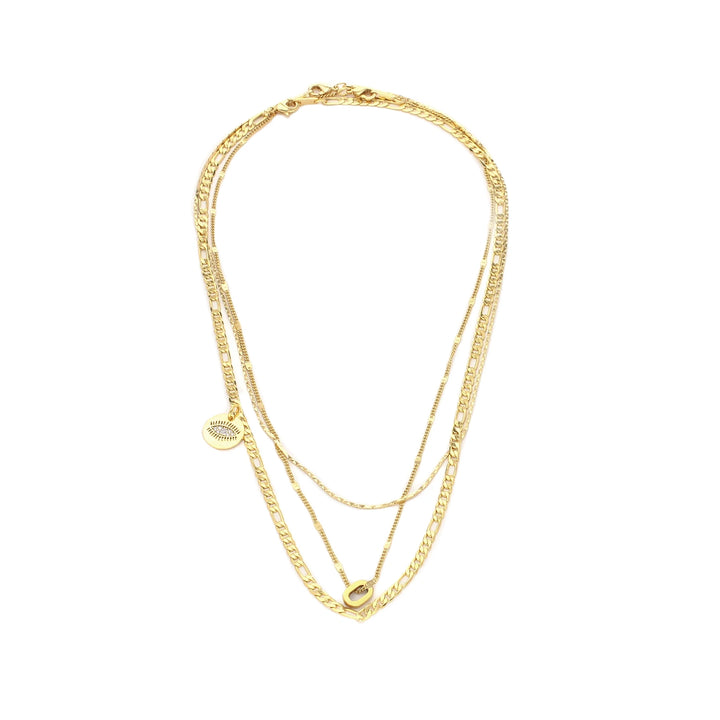 The PURE NECKLACE SET, which is a layered gold-tone necklace featuring three distinct chains, combines delicate and bold designs for a versatile and chic look. This set includes minimalist pendants, including a circular medallion and an elegant oval charm, perfect for adding a touch of sophistication to casual or formal outfits.