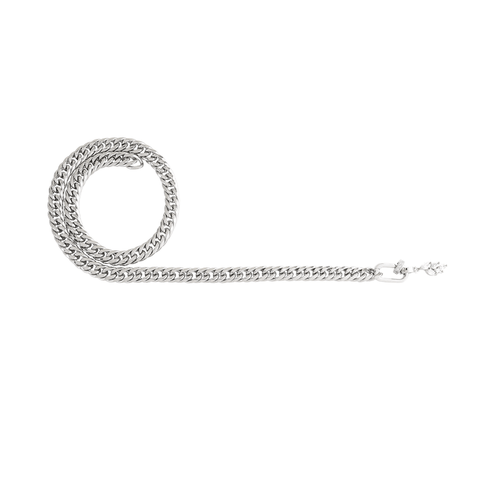 The Slim Just Click Chain, which is a single-layer silver chain necklace featuring bold curb links, a sleek clasp, and sparkling crystal-adorned charms, offering a minimalist yet statement design.
