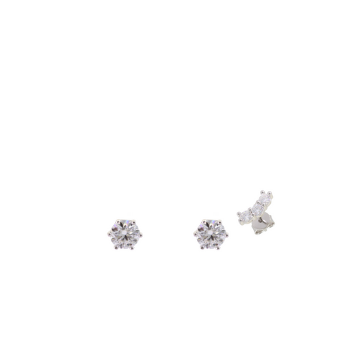 Thee BRIGHT SOLITAIRE SET which is an Elegant three-piece Diamond Stud Earrings Set with a Hexagon-Cut Center Stone and Smaller Accents.