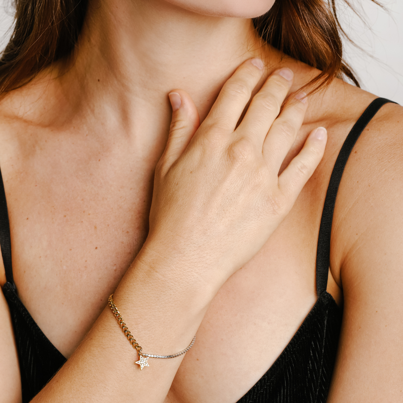 Model wearing the ESPRESSO BLENDED BRACELET which is Half 925 sterling silver zirconia chain and Half stainless steel 18k gold plated chain, 7" length with 18k gold plated zirconia star pendant.