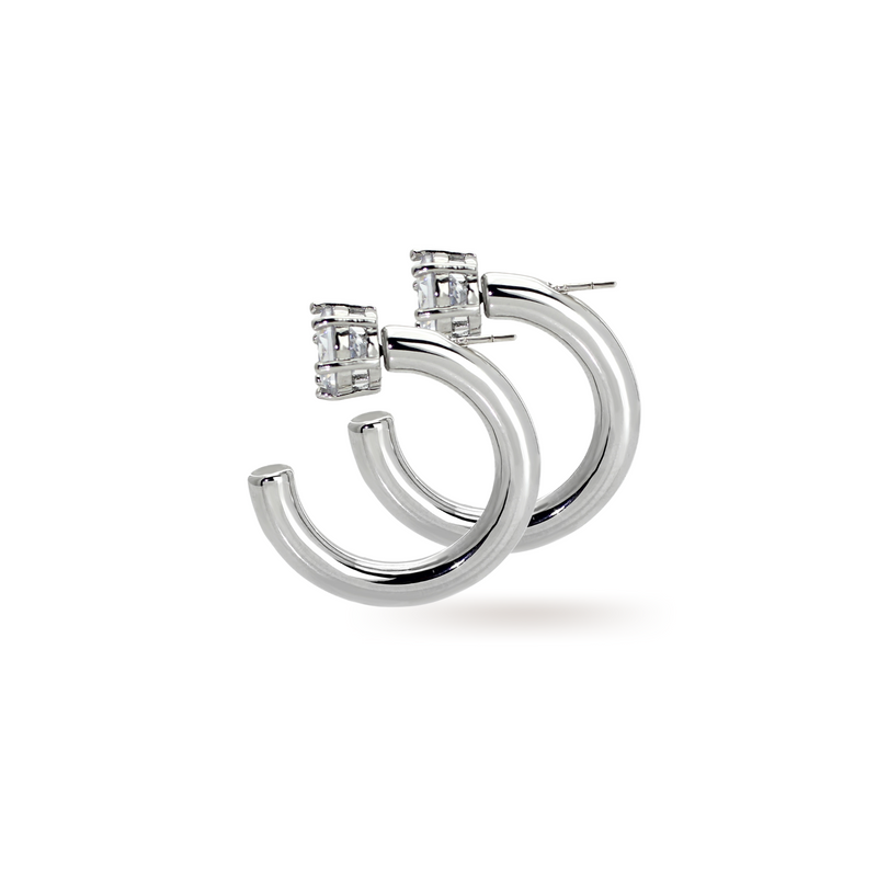The FLIP HOOPS which is a pair of hoop earring made out of copper and Rhodium plated with a delicate diamond stud.