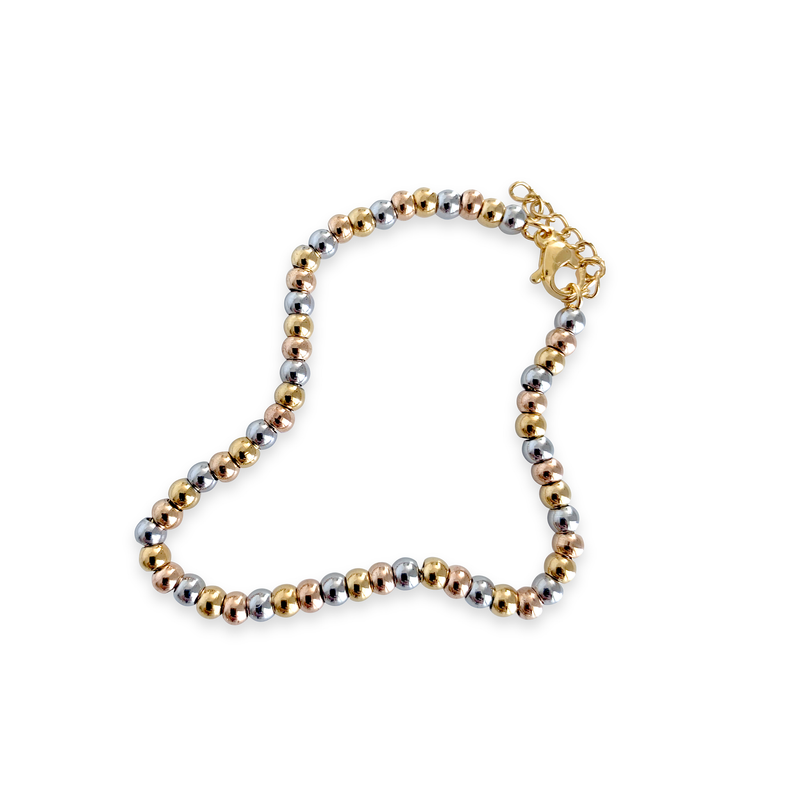 THE PUNTITOS Mix Small made of Stainless Steel Gold and Silver circle beads.