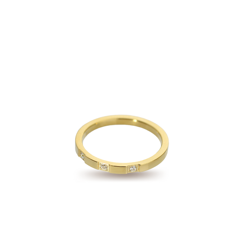 The ZIRCONIA DOTS RING which is an 18k Gold plated thin ring with encrusted cubic zirconia.