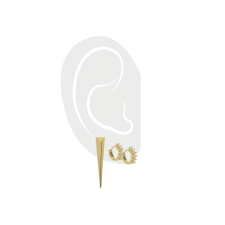 Pair of Gold huggies earrings with zirconia stones, 0.9 mm in size and 1 individual gold needle earring which is an 18k gold plated triangle shaped earring. ||| GOLD