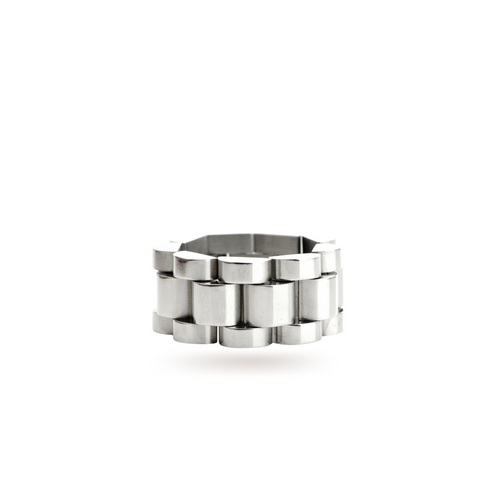The Move Ring, a silver ring with a unique design resembling interlocking silver links. ||| SILVER