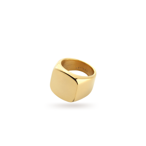 The Forever Ring Gold, a bold and minimalist gold ring with a smooth, square face design. This statement piece adds a touch of modern sophistication, perfect for wearing alone or pairing with other rings for a stacked look.