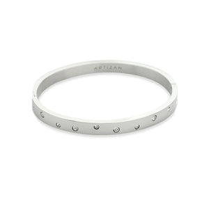 Elegant Bubbles Bangle featuring a sleek silver band adorned with sparkling diamonds.