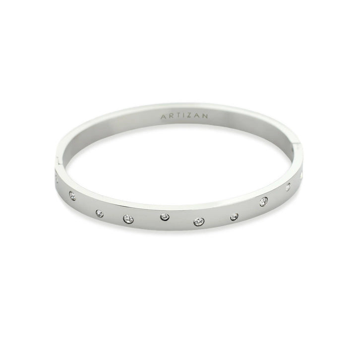 Elegant Bubbles Bangle featuring a sleek silver band adorned with sparkling diamonds. ||| SILVER