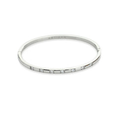 The Shine Clasp Bracelet Stack, which is a three-piece silver bracelet stack, features bold chain links, delicate stone detailing, and a stylish clasp closure adorned with shimmering stones, offering a sophisticated mix of textures for a polished and modern look. ||| SILVER