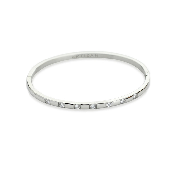 The Shine Clasp Bracelet Stack, which is a three-piece silver bracelet stack, features bold chain links, delicate stone detailing, and a stylish clasp closure adorned with shimmering stones, offering a sophisticated mix of textures for a polished and modern look. ||| SILVER
