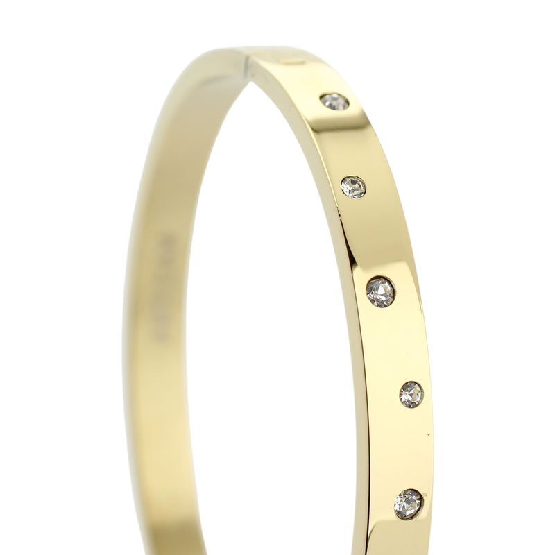 The BUBBLES BANGLE which is made of Gold plated Stainless steel with encrusted zirconias around.