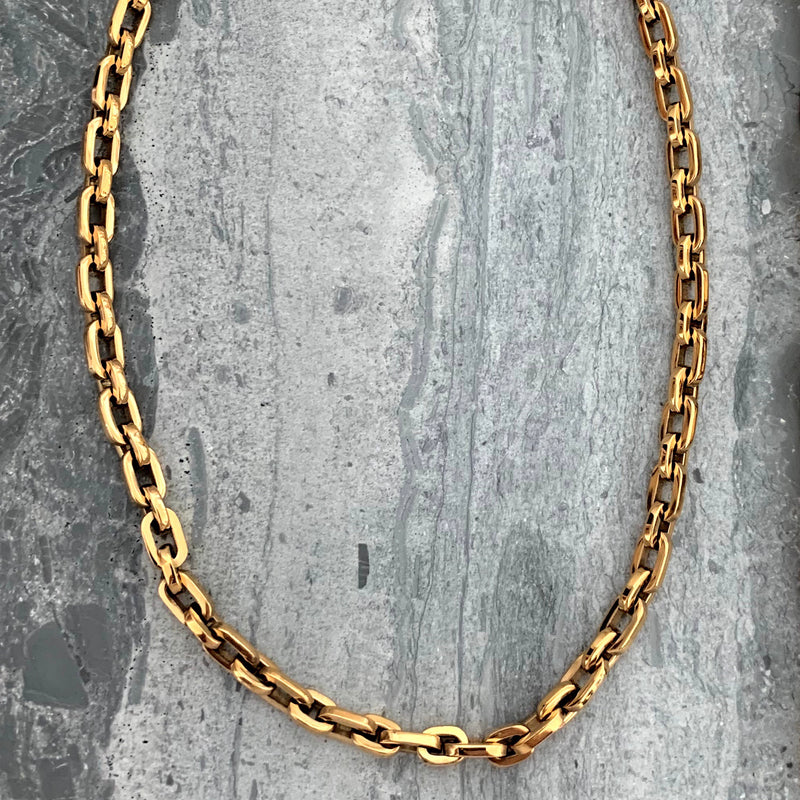 The Puerto Chain Small which is made of Stainless steel 18k gold plated chain links. The necklace is 16 inches long and great for layering necklaces.