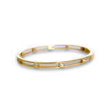 Exquisite Gold Bangle Adorned with Brilliant-Cut Diamonds