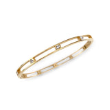 Exquisite Gold Bangle Adorned with Brilliant-Cut Diamonds