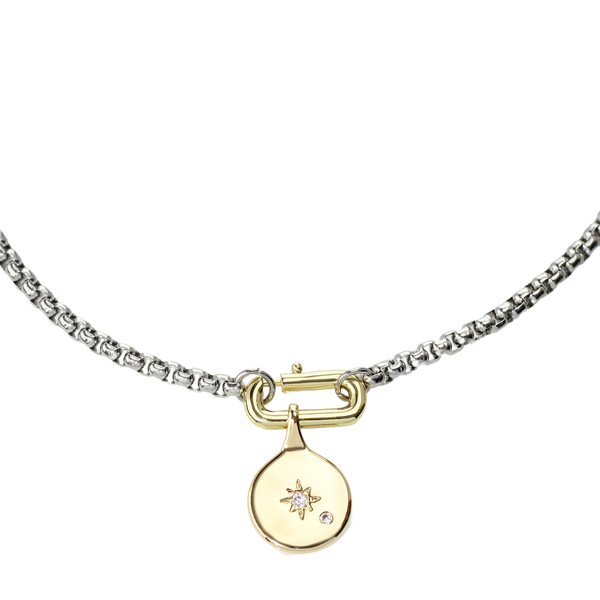 The BOX CHARM NECKLACE which is made of 16" stainless steel chain with Gold filled oval clasp and 24k gold filled north star pendant.
