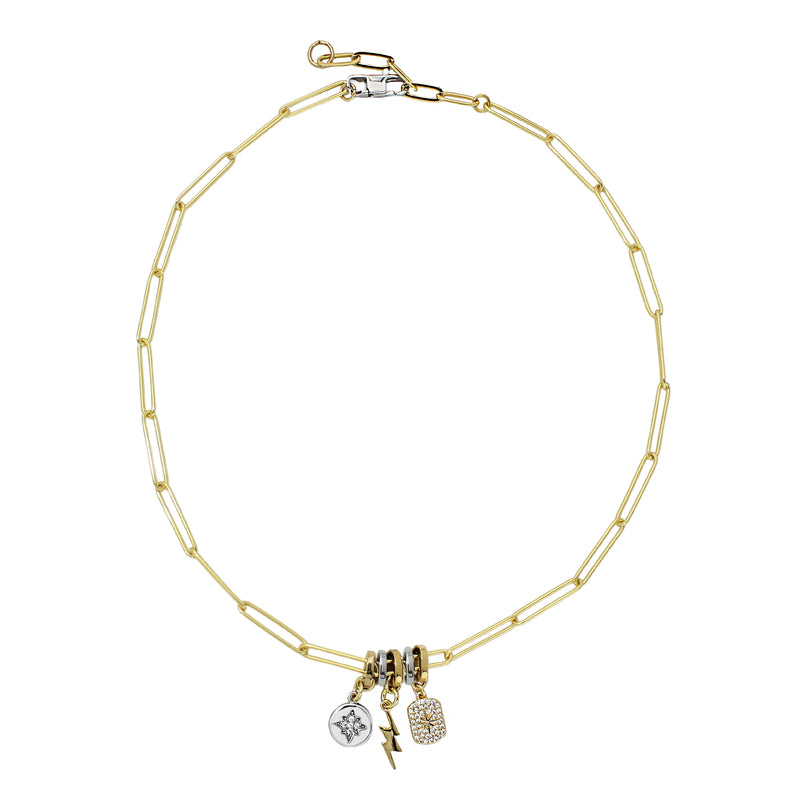 The LINK CHARM NECKLACE which is made of 925 sterling silver 18K gold plated bold link16" long chain and has three charms on it, the Dainty pave gold filled celestial star tag, lightning bolt charm and a Silver north star charm.
