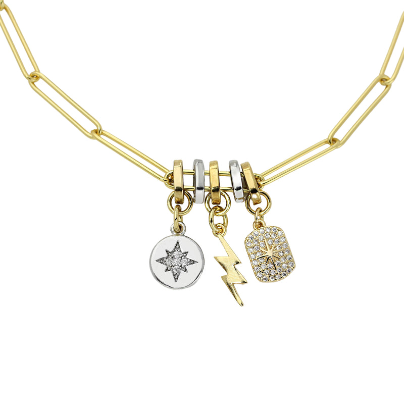 The LINK CHARM NECKLACE which is made of 925 sterling silver 18K gold plated bold link16" long chain and has three charms on it, the Dainty pave gold filled celestial star tag, lightning bolt charm and a Silver north star charm.
