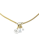 The can opener necklace featuring The MINI STAR LINK CHARM which is a  silver diamond encrusted star charm with gold link, the drop charm and round silver charm with north star diamond detail.