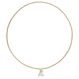 The can opener necklace in gold with silver can opener clasp with a gold lightning bolt charm with pave-set diamond-like stones and a a circle charm with star burst detail.
