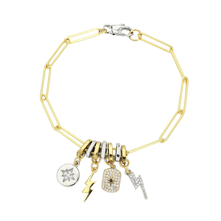 The LINK CHARM BRACELET which is 925 sterling silver 18K gold plated bold link chain with Dainty pave gold filled celestial star tag, lightning bolt charm and Silver north star charm.