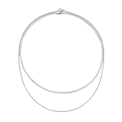 The Tennis Dainty Necklace Set, a two-piece silver necklace set featuring two diamond-like tennis necklaces.

