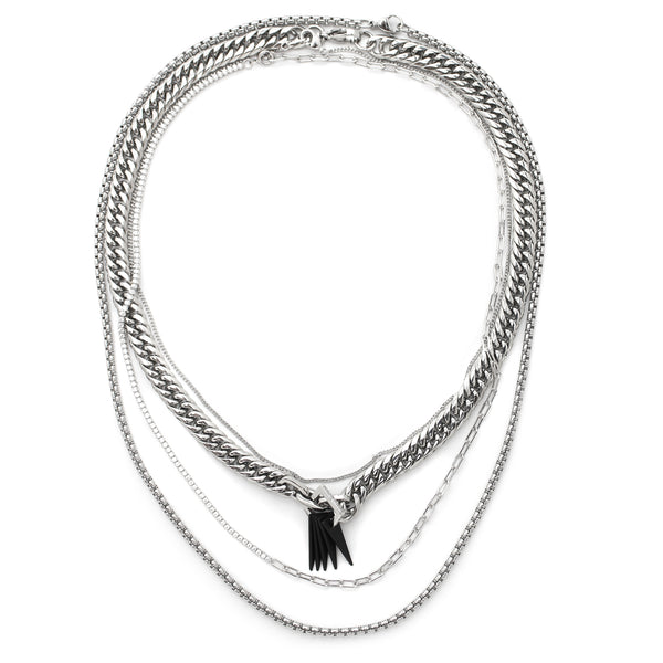 STRONG LAYERED NECKLACE SET includes 4 separate Stainless steel chains. It comes with the 17 inches puerto chain with Black triangle charms & Zirconia. One 16inches thin silver necklace, 17 inches Mini zirconia necklace and 20 inches plain silver chain.