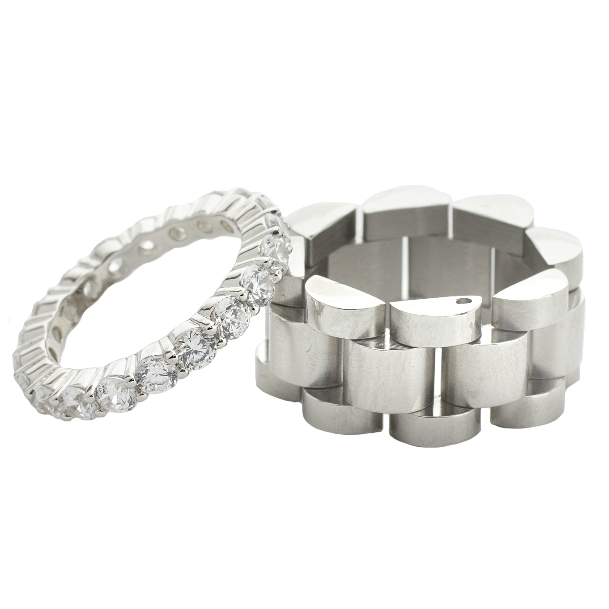 The synergy ring set includes 2 rings. One is the Eternity Ring which is made of 925 sterling silver dainty ring and the Move ring  which is a Stainless steel chain ring.