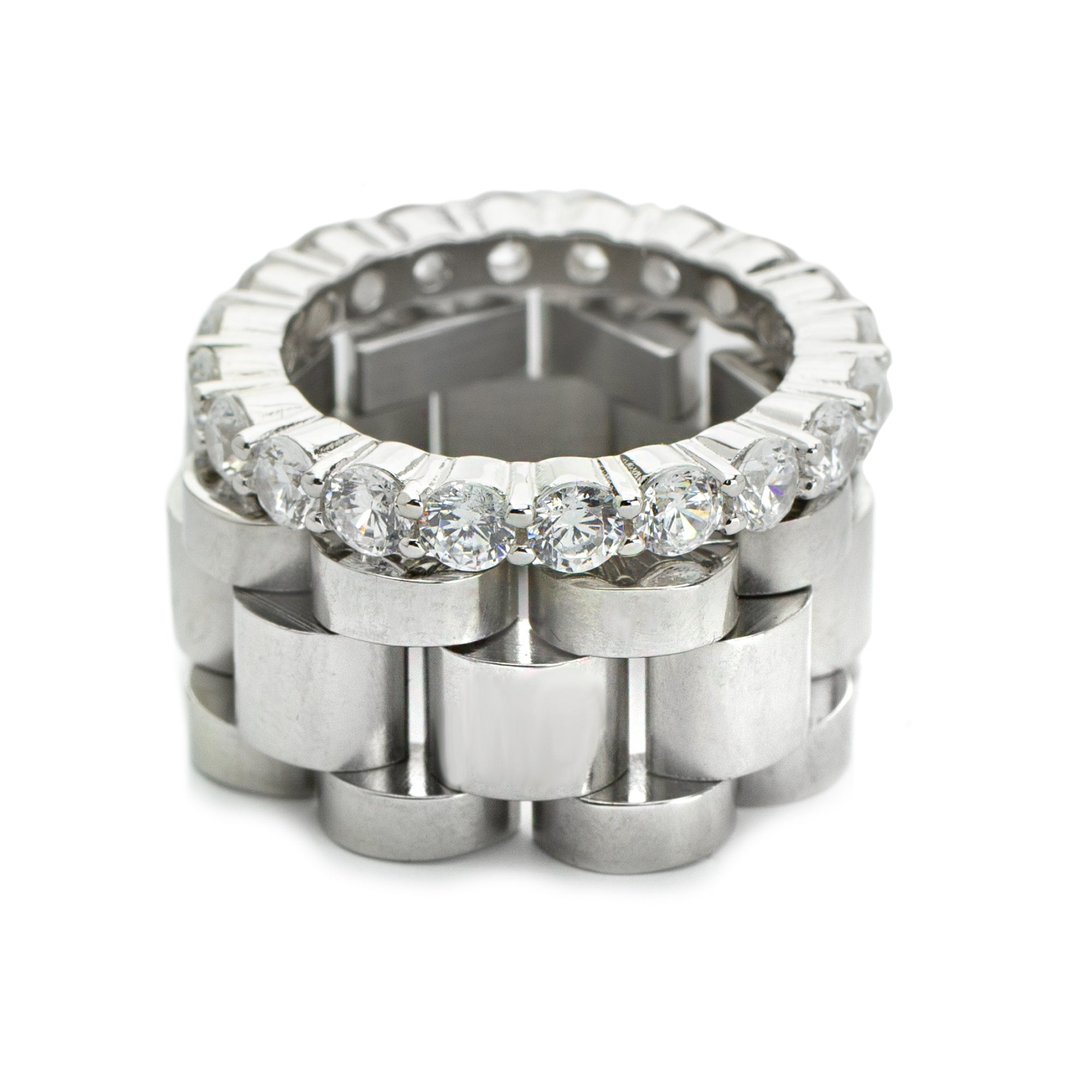 The synergy ring set includes 2 rings. One is the Eternity Ring which is made of 925 sterling silver dainty ring and the Move ring  which is a Stainless steel chain ring.
