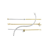 The BLENDED LUXE SET, a stylish four-piece bracelet set featuring a mix of gold and silver chains with sparkling diamond accents and delicate charms. 