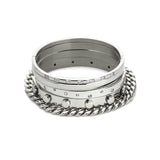 The Vigorous Stack, a five-piece silver bangle set featuring various styles with cubic zirconia accents.
