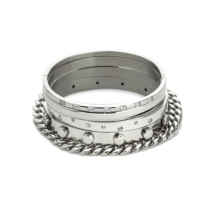 The Vigorous Stack, a five-piece silver bangle set featuring various styles with cubic zirconia accents.