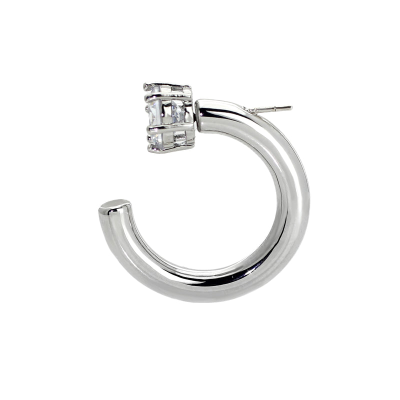 One of the FLIP HOOPS which is a hoop earring made out of copper and Rhodium plated with a delicate diamond stud.