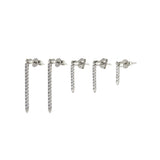 The BAMBOO EAR SET- 3 & 2 HOLES, a stylish ear piercing set featuring five long, slender earrings with diamond accents in different lengths. Perfect for creating a bold and edgy look with multiple piercings.