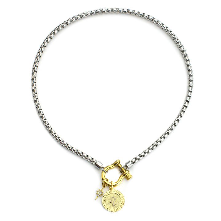 The Leo Herradura Zodiac Necklace which is made of 18” Hypoallergenic Rhodium Plated Stainless Steel chain with 18K Gold Plated Horseshoe clasp and miniature star pendant and circular star sign micro pave Leo constellation charm. |||LEO/MIX