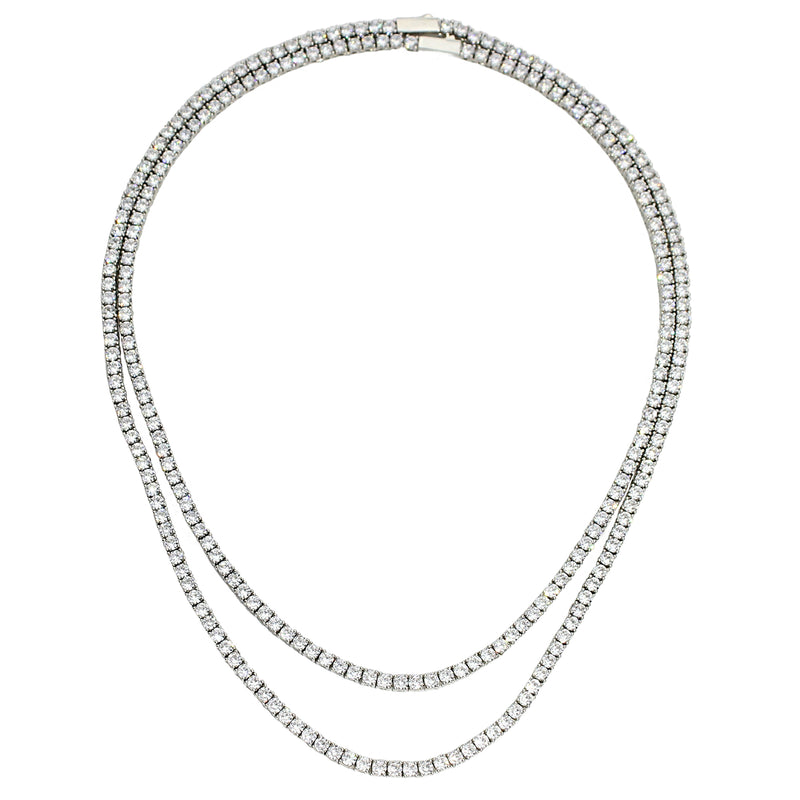 The TENNIS NECKLACE SET which includes two Rhodium-plated brass/cubic zirconia tennis necklaces in 16 and 18 inches length.